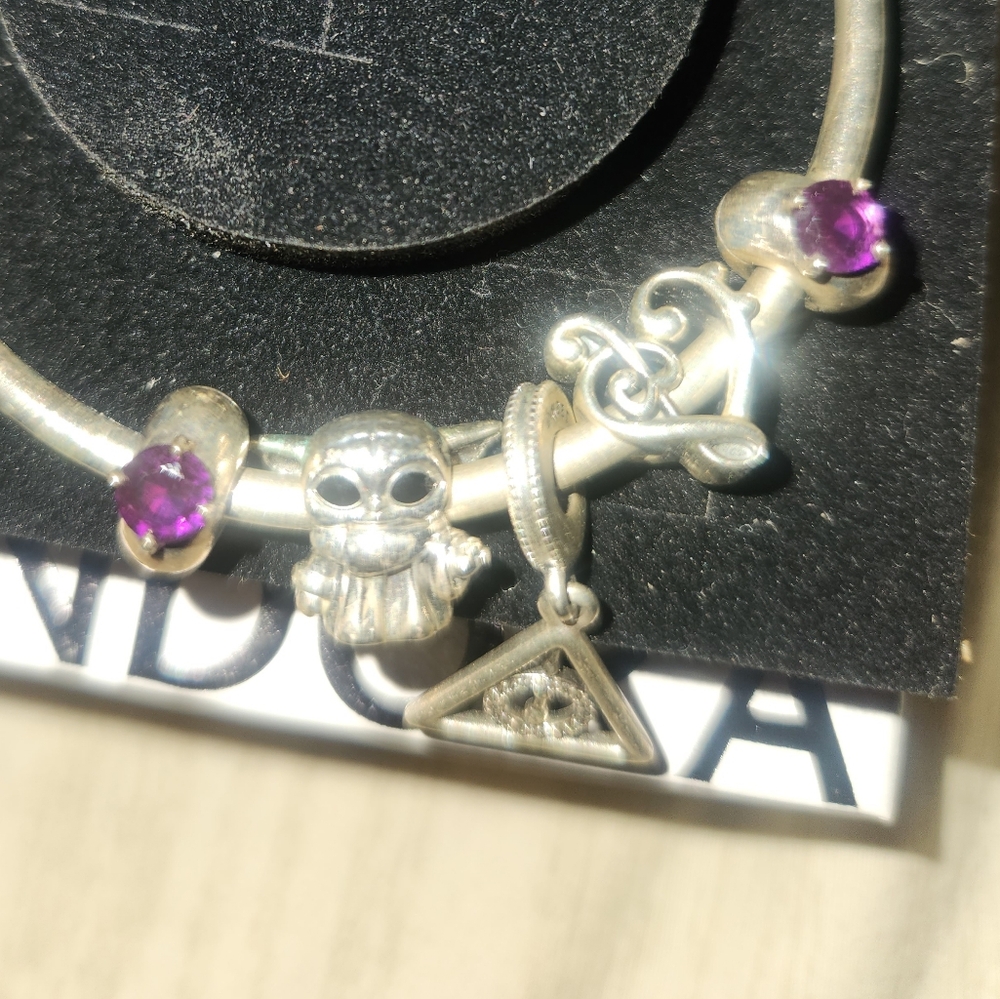 Pandora Silver bracelet with charms